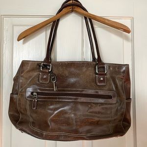 Brown leather Fossil bag with loads of pockets!